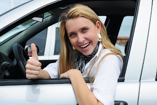 Real Estate Agent Driving Car